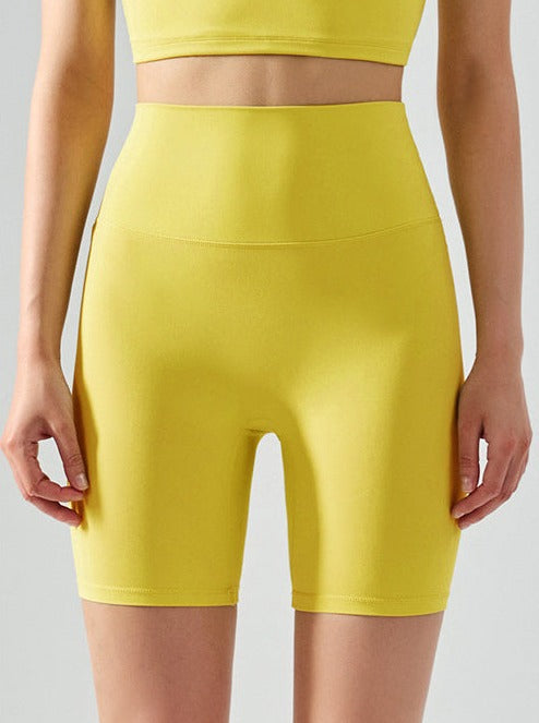 Short de yoga taille haute élastique sans couture de couleur unie 