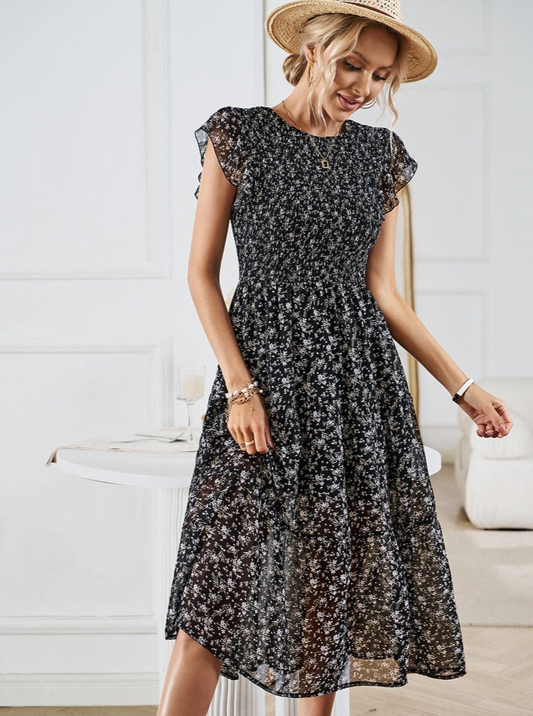 Robe mi-longue à volants et taille définie avec motif floral 